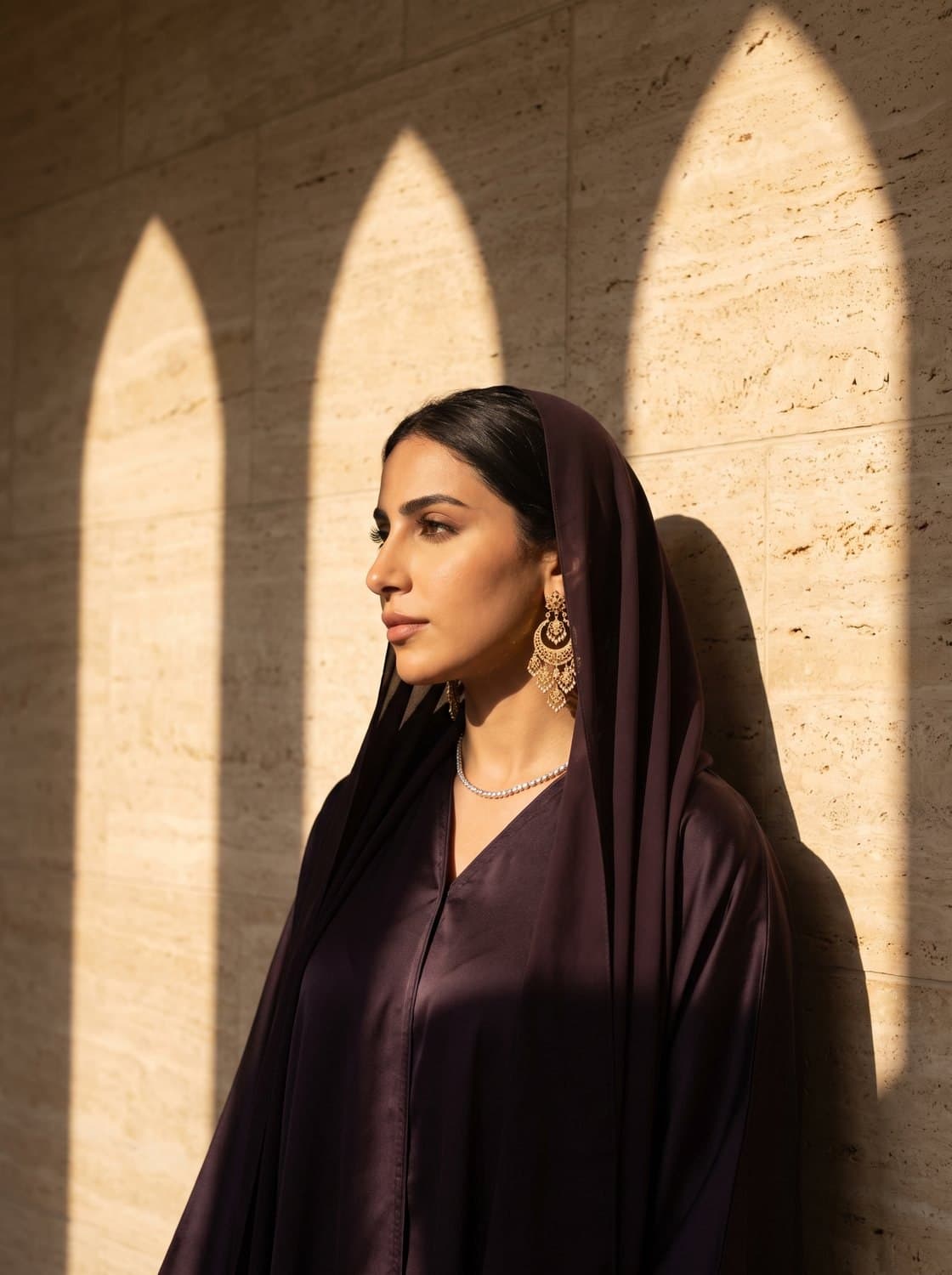 The OREVANI muse wearing gold