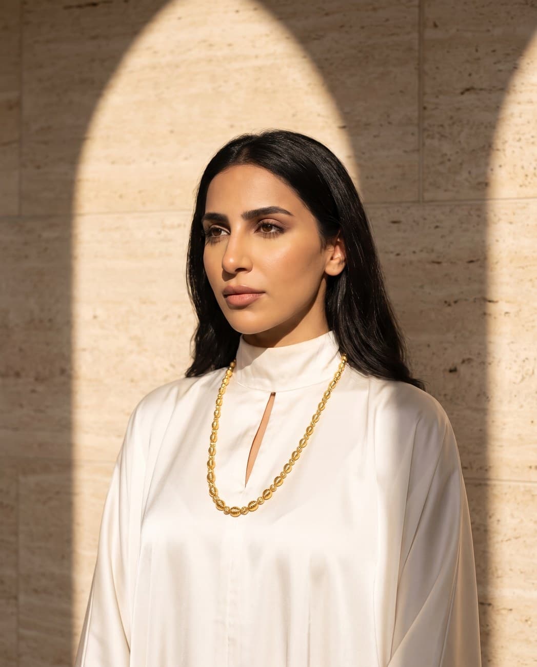 Wathiqa · campaign photograph, worn