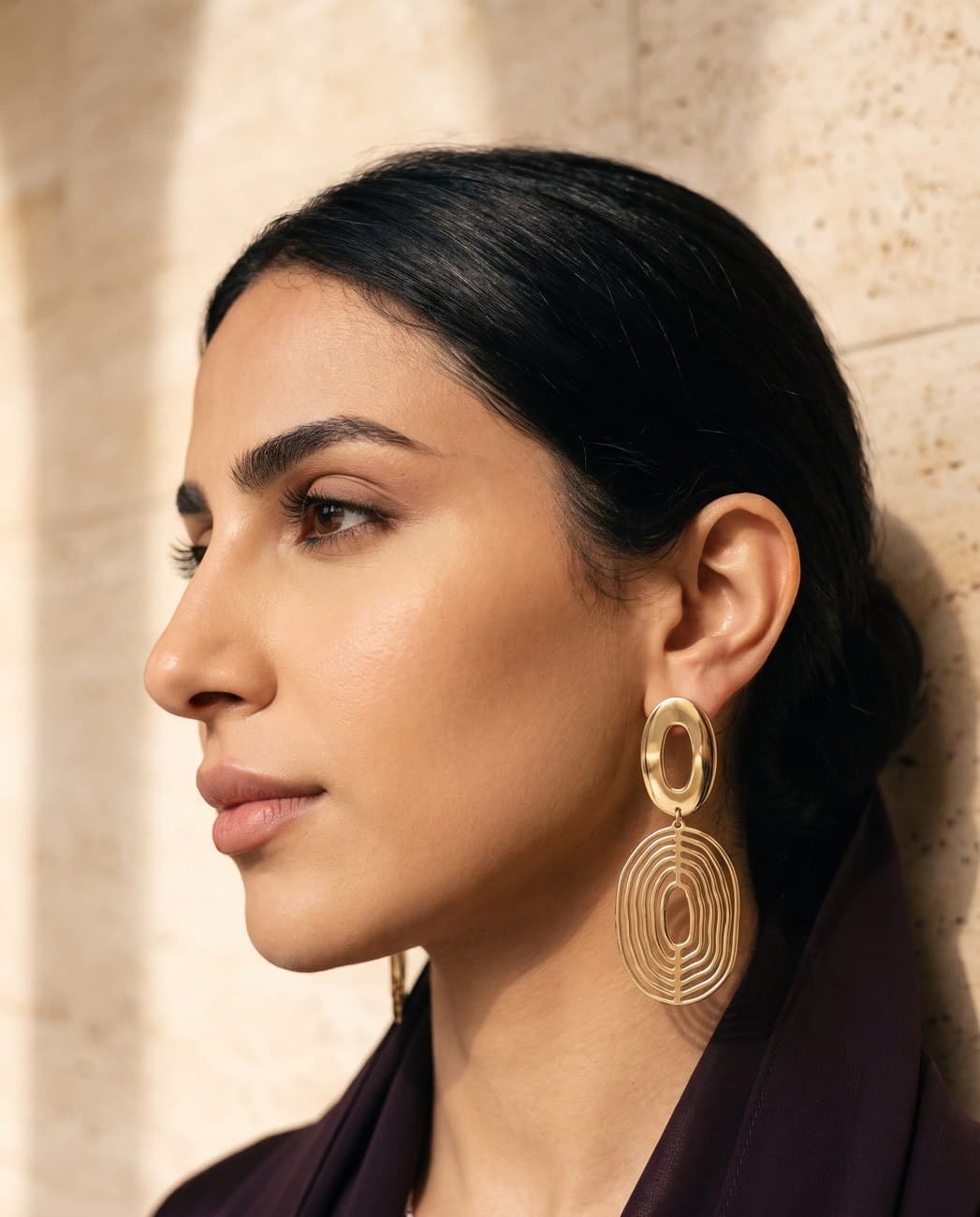 Qamar · campaign photograph, worn