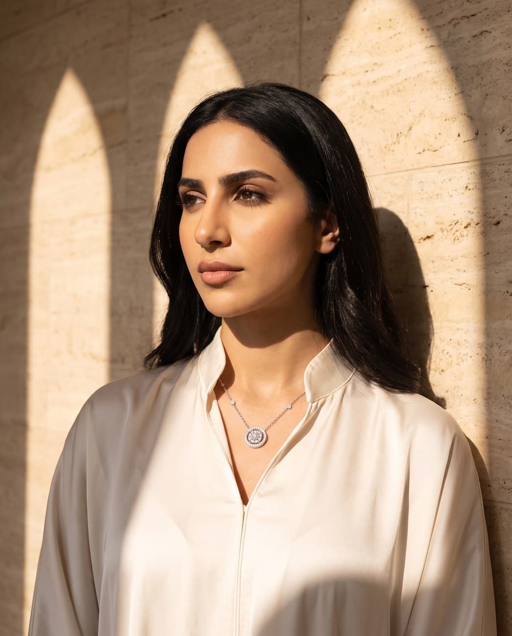 Qalada · campaign photograph, worn
