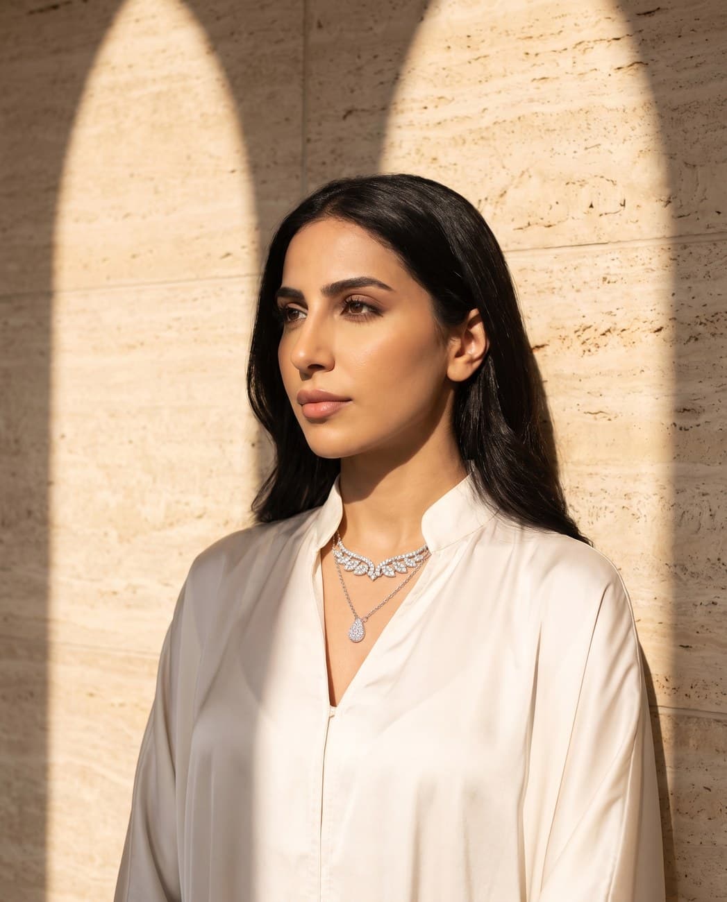 Raihana · campaign photograph, worn